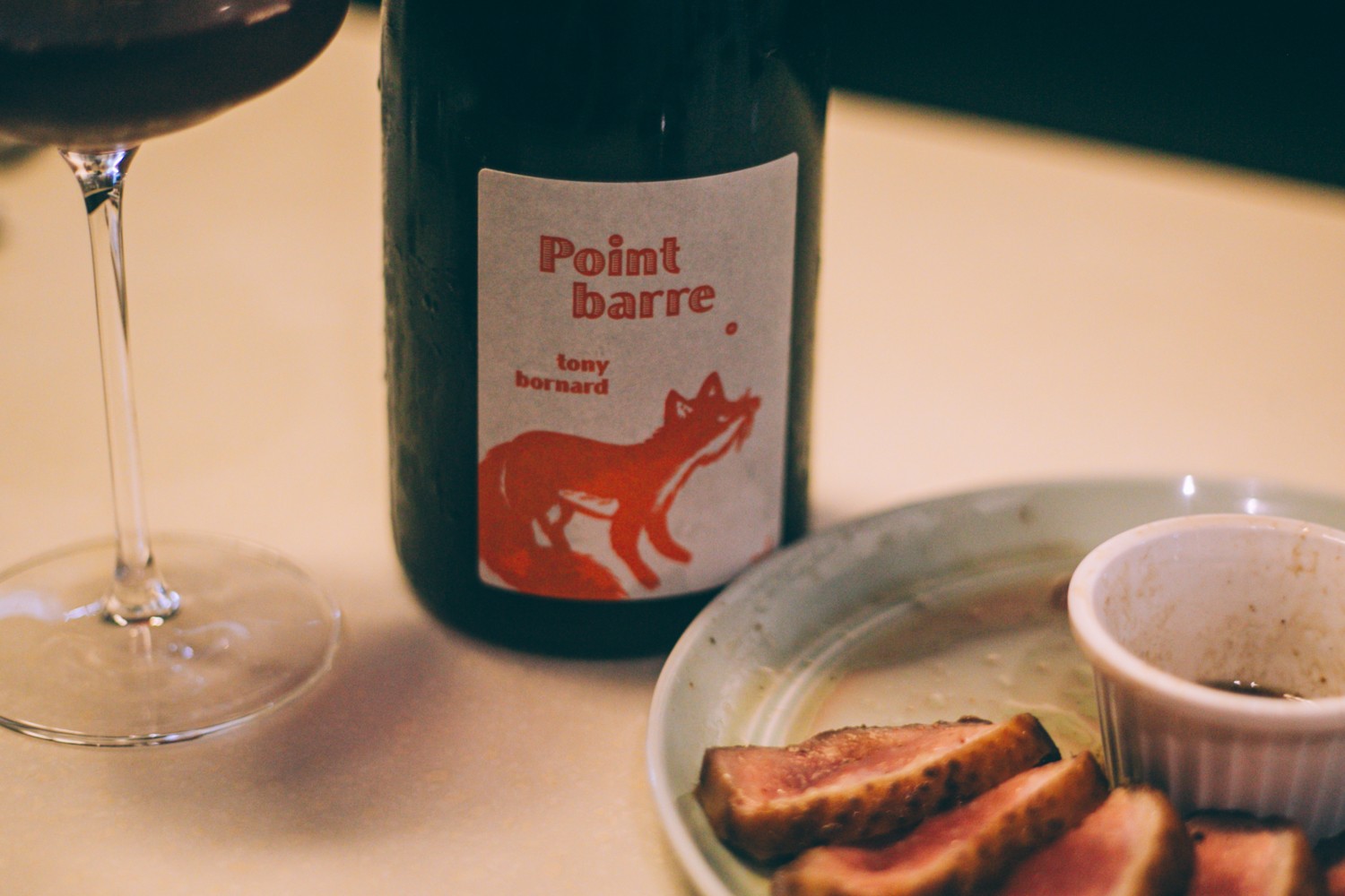 A Domaine Bornard red against sliced duck breast